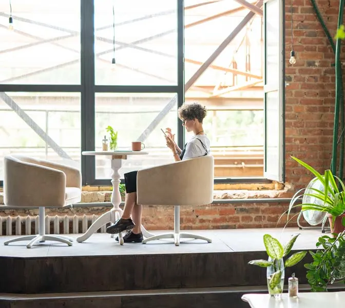 Woman working in a bright office environment